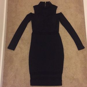 Black, bodycon dress with mesh sleeves and inserts